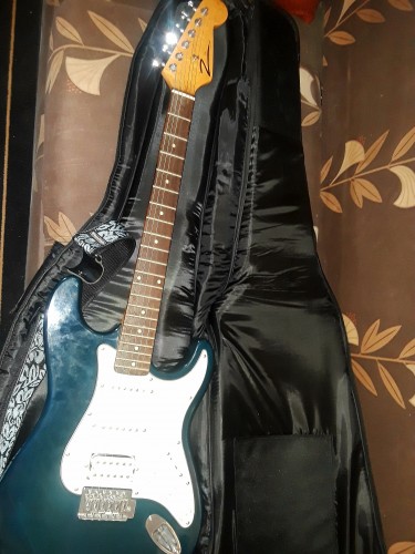 Fender Electric Guitar With Case And Pick