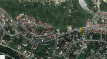 1/4 ACRE SLOPING LAND