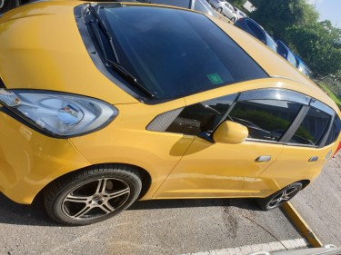 2011 Yellow Honda Fit 