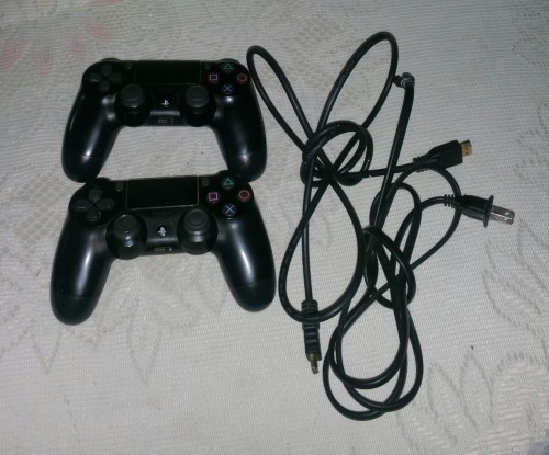 Ps4 And Disk With Controller