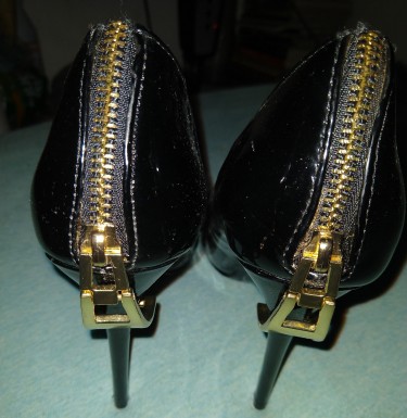 Black High Heels With Gold Zipper, Size 8.