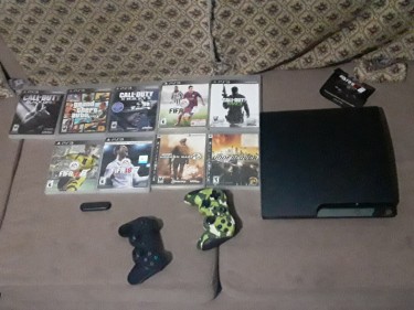 PlayStation 3 With 9 Games With 3 Controllers     