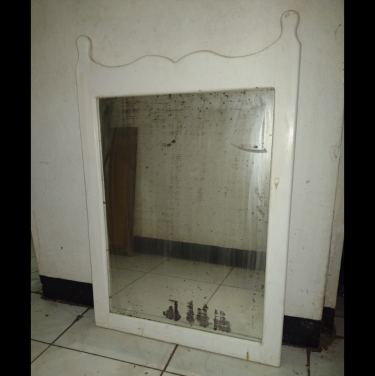 Several Mirrors Of Different Sizes 