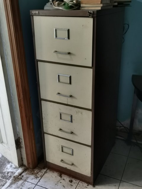 SOLID METAL FILING CABINET