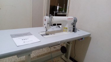 Sewing Machine.  Straight Stitcher