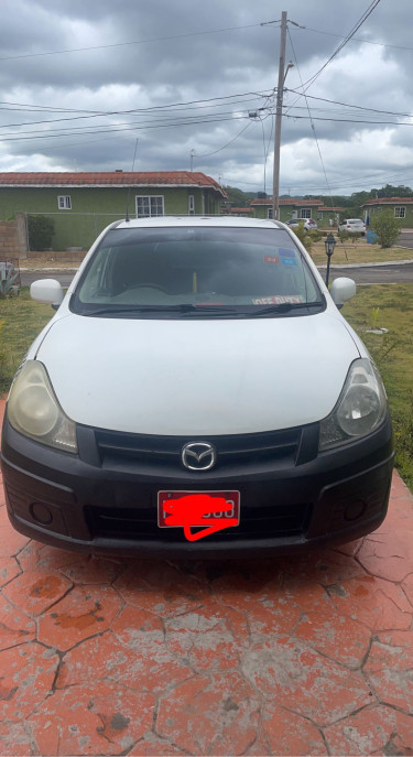 2010 Mazda  Taxi N Rd License 