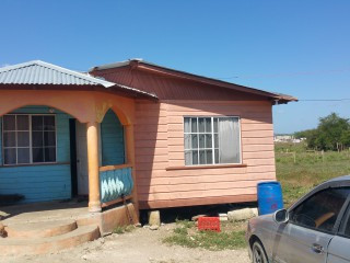 2 Bedroom Board And Concreate For Sale With Land
