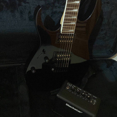 Ibanez Electric Guitar With Case & Amp