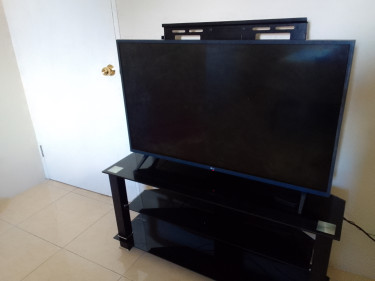 43 In  LG FLAT SCREEN SMART TV With Stand