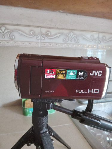 JVC HD Everio Camcorder Along With Mini Tripod