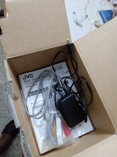 JVC HD Everio Camcorder Along With Mini Tripod