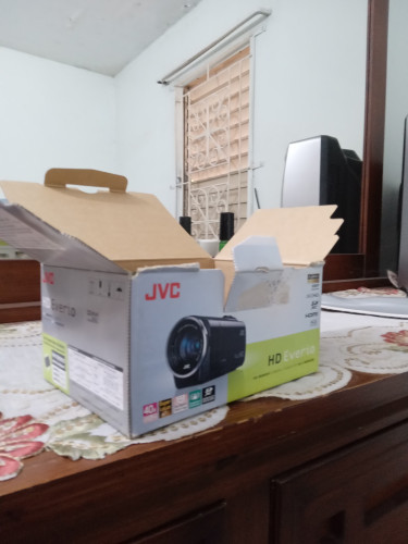 JVC HD Everio Camcorder Along With Mini Tripod