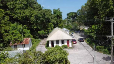 Prime Commercial Land With Building In Tower Isle