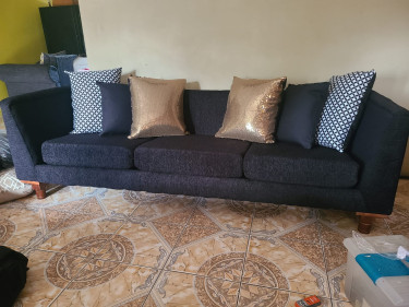 Brand New Black 4 Seater (1 Piece)Cushions Include