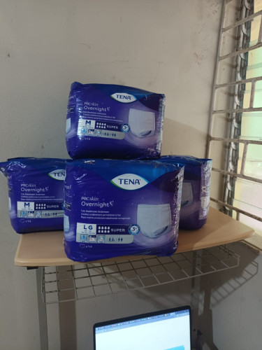 Four (4) Adult Diapers (TENA Brand)