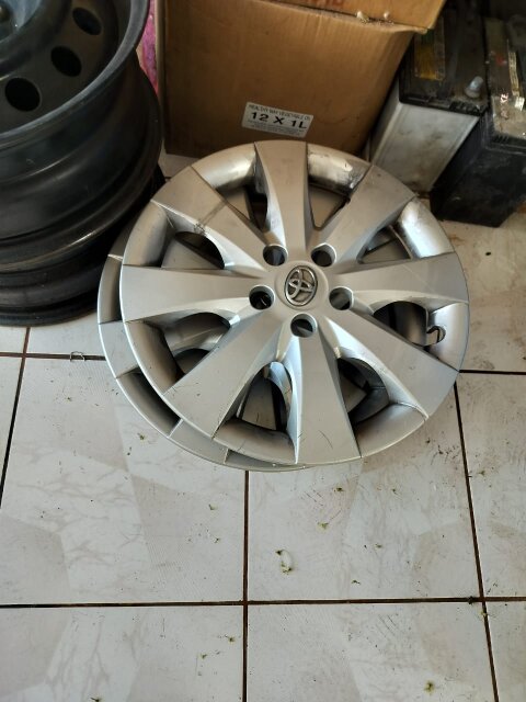15” Factory Rims And Toyota Hubcap And Tires