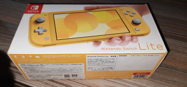 Nintendo Switch Lite + Extra Accessories