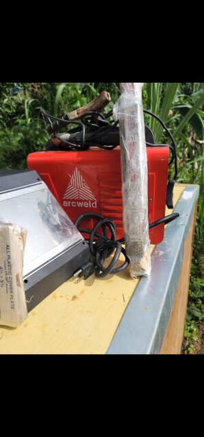 Arc Welding With Helmet And Rod For Sale