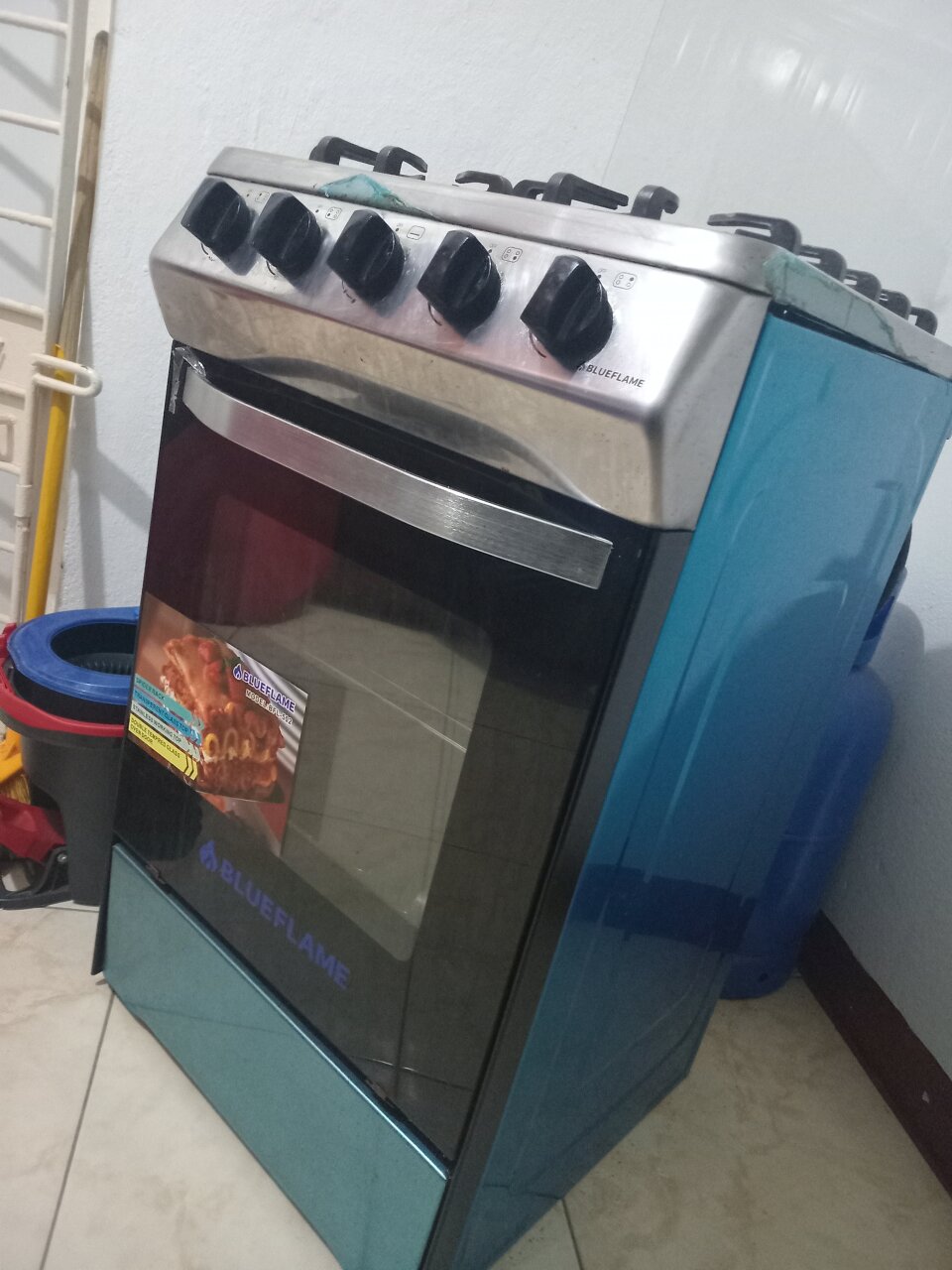 FOR SALE: BlueFlame 4-Burner Gas Stove With Oven